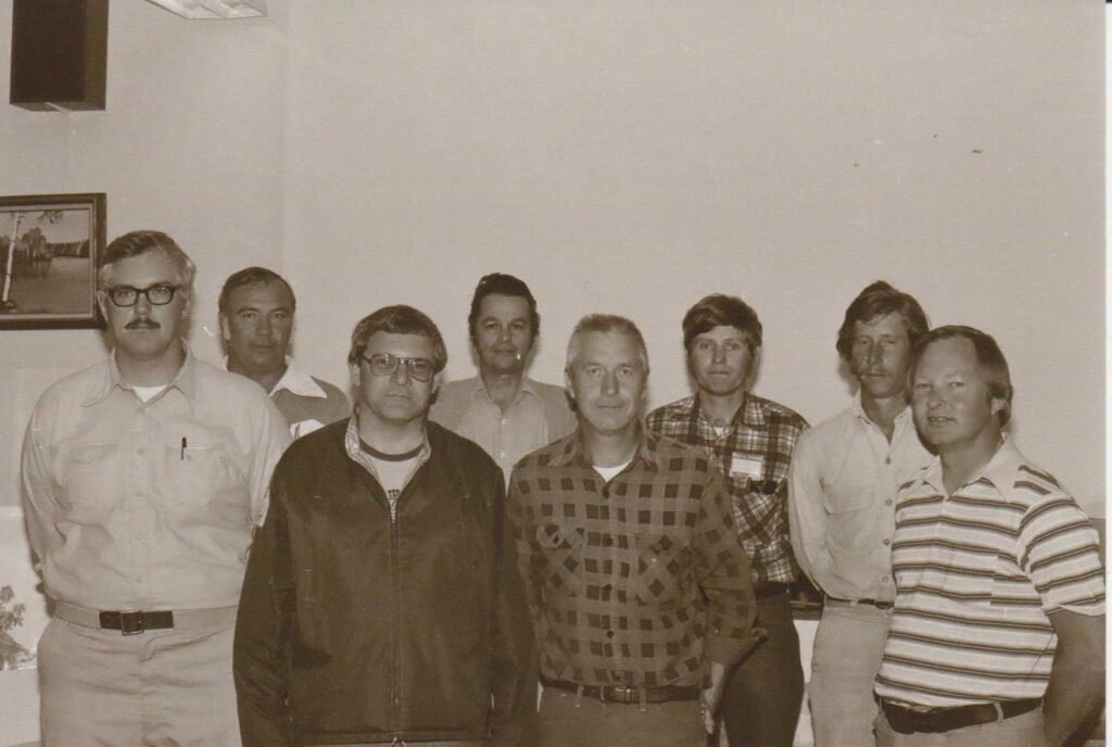 First WOCA Board of Directors. Left to Right: Front row: Dave Otto, outdoor editor for the Green Bay Press Gazette; Steve Henry, Lucky 13 Fishing Show host Eau Claire TV; Jim Rehbein, freelance outdoor columnist Janesville; and Walt Sandburg, writer from Green Bay. Back Row: Jim Harp, outdoor writer Appleton Post Crescent; Jim Jones, public relations John and Johnson Company Racine; Tim Eisele, public information officer DNR Eau Claire; and Jack Seiffert, naturalist Trees For Tomorrow.